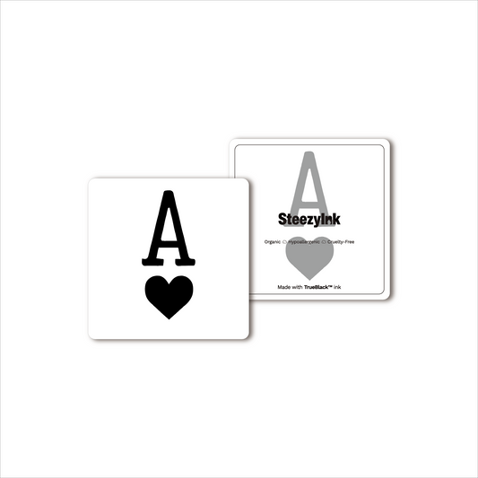 Ace of Hearts temporary tattoo, black design on white. Made with Pure Black Ink™