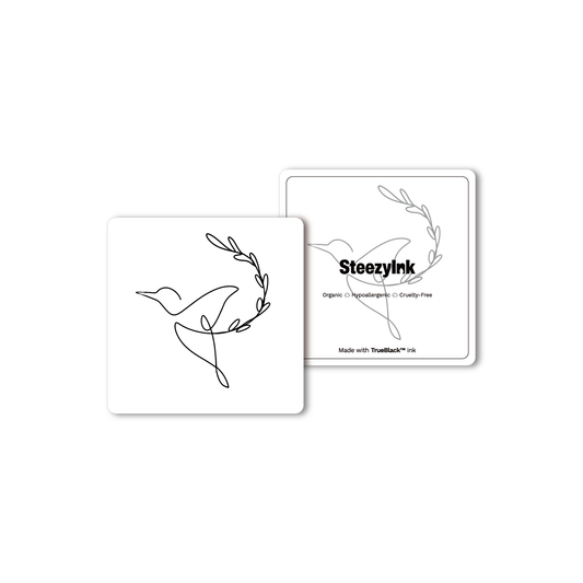 Hummingbird temporary tattoo, single-line design, black ink, olive branch, Pure Black Ink™.