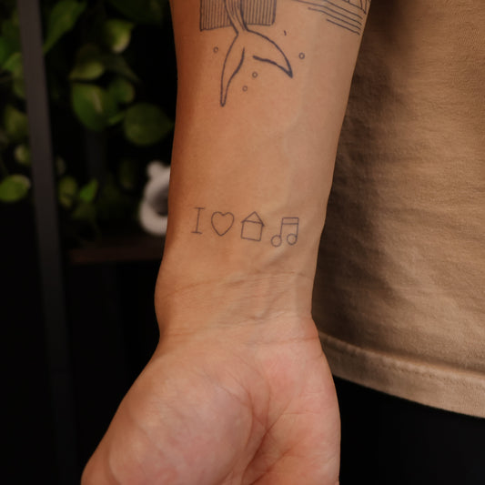 SteezyInk I Love House Music temporary tattoo on wrist. Black ink heart, house, music note design.