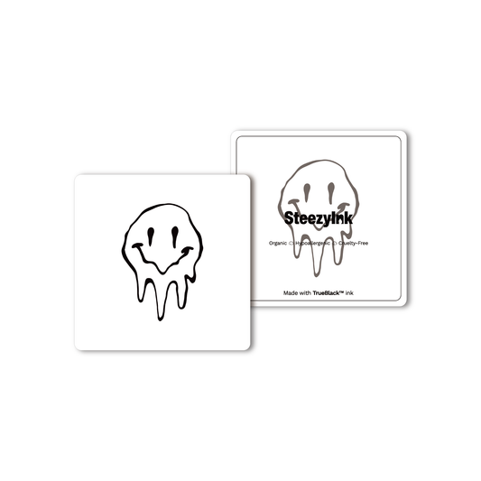 Smiley temporary tattoos. Black melting smiley face design, organic, cruelty-free, made with Pure Black Ink™.