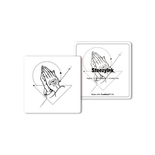 Prayer Temporary Tattoo featuring praying hands with eye and tears, using Pure Black Ink™, spiritual art.