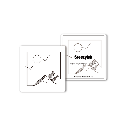 Sun Peaks Temporary Tattoo design with mountain and sun, made with Pure Black Ink™, organic and hypoallergenic