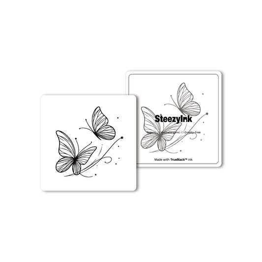 Twin Wings Temporary Tattoo product shot, black butterfly design, Pure Black Ink™, 1-2 week wear.