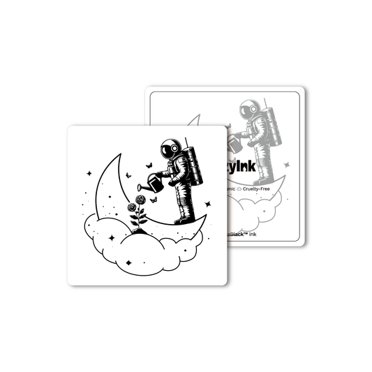 Moon Garden temporary tattoo design featuring an astronaut watering roses on a moon, Pure Black Ink™