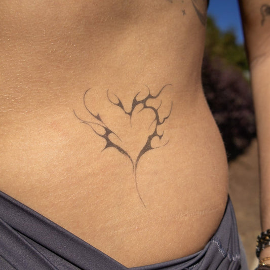 Flame Heart Temporary Tattoo on torso. Black heart design, Pure Black Ink™, semi-permanent